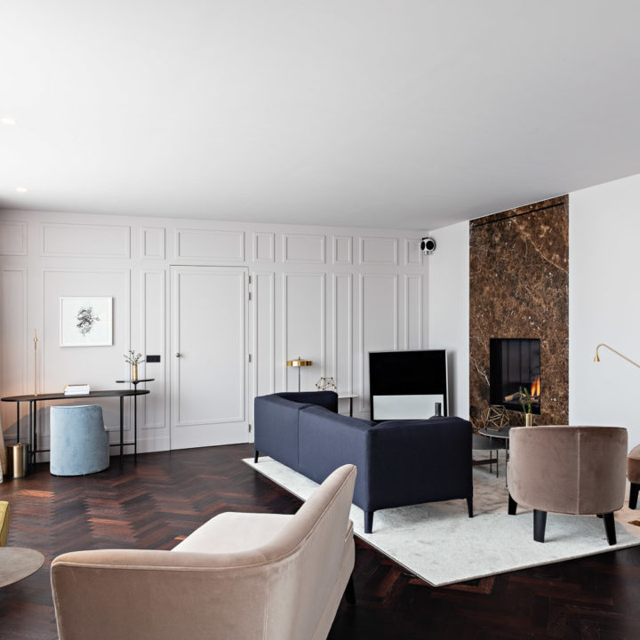 The living room with colorful furniture in a hotel suite