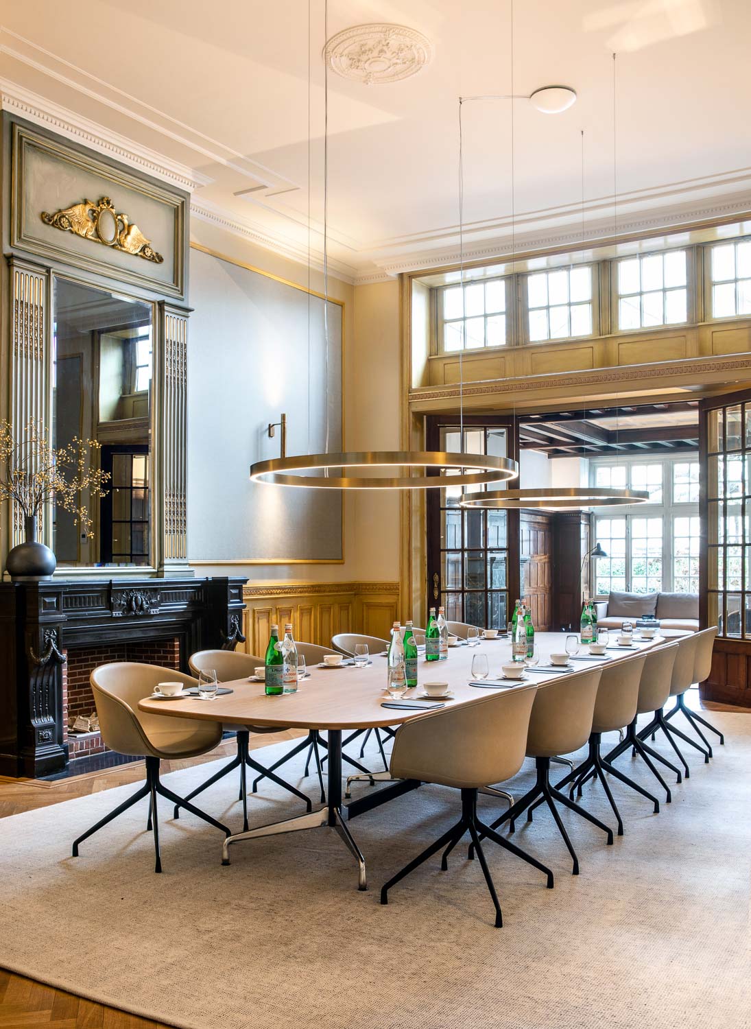 A classic meeting room with a long table in a historic building in Ghent